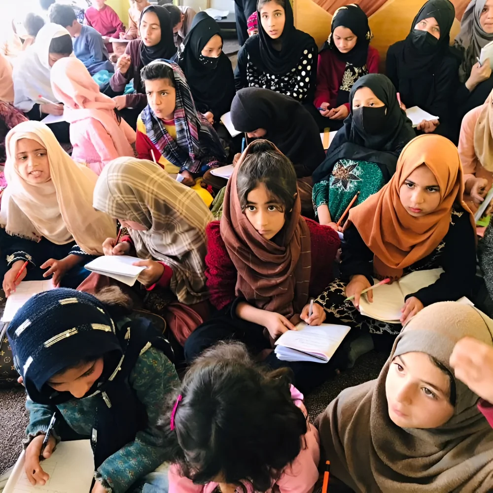 A teacher leading a community class for girls in Afghanistan